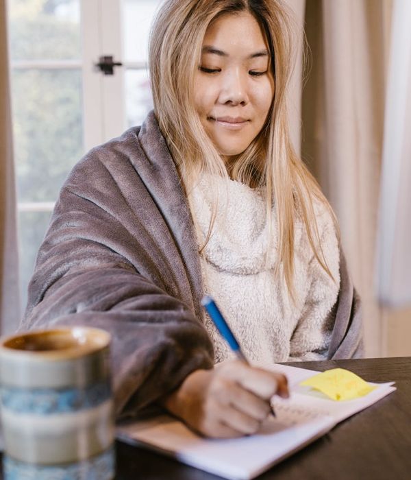 Person focusing on distance in a green park environment